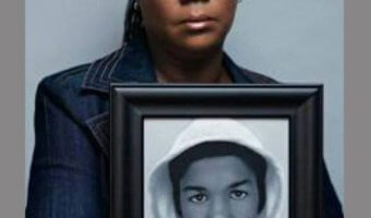 Mother holding picture of Trayvon